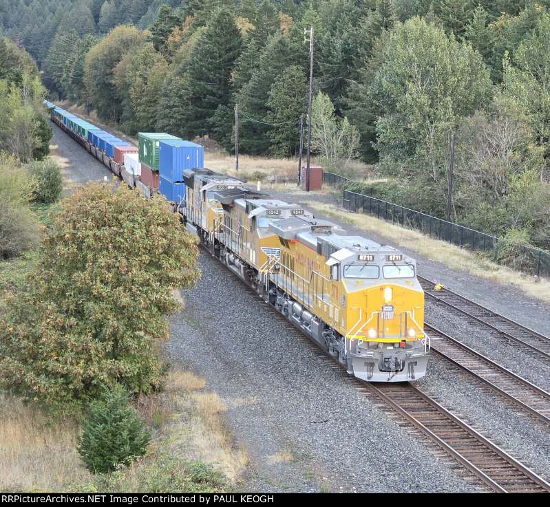 UP 5711 Pulls Into The Siding just East Of Hood River, Oregon Leading A Stack